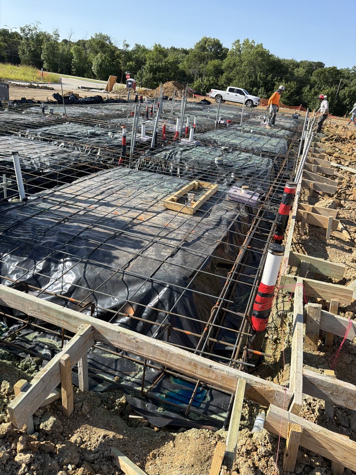 Reinforcing steel and forms prepared for a concrete foundation